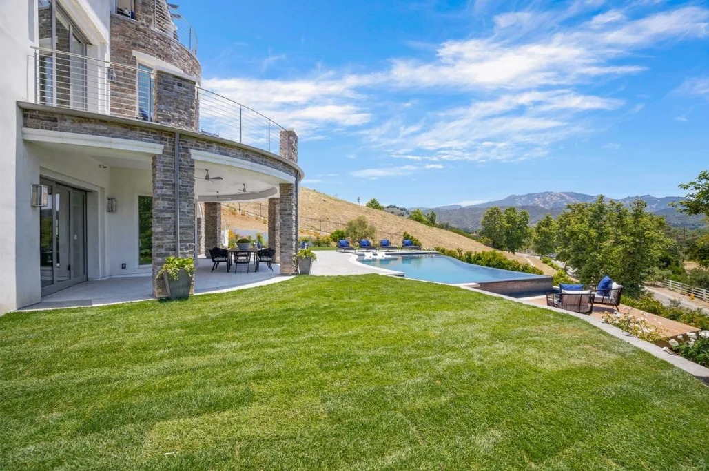 Covered terrace and pool deck overlooking the Santa Monica Mountains