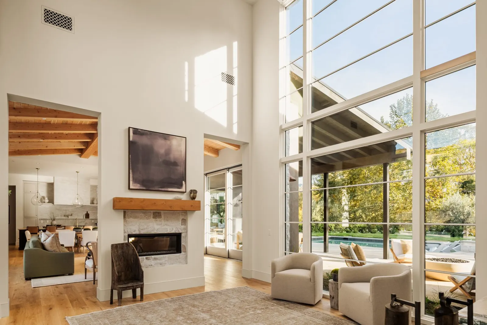 Two-story great room with walls of glass